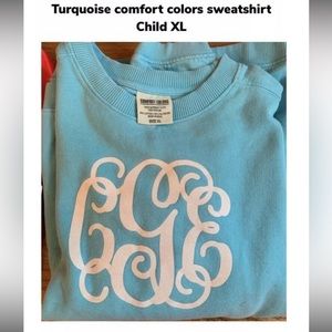 Set of multiple girls clothes with cGe initials.